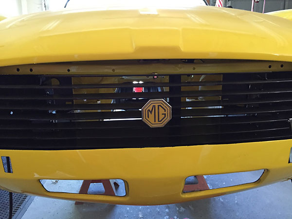 Customized grille-mounted MG insignia.