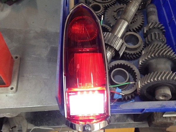 Modified 1967 taillamps, featuring specially built-in back up lights.