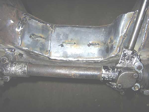 Modified front crossmember (for oil pan clearance)