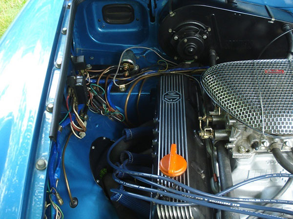 MG RV8 style four-into-one headers.