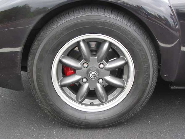 Volvo disc brakes can be spotted behind John's Minilite 8-spoke wheels.