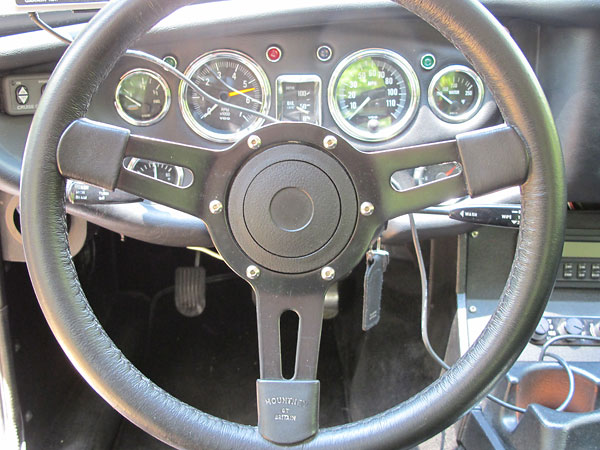 Mountney of Britain leather wrapped steering wheel.