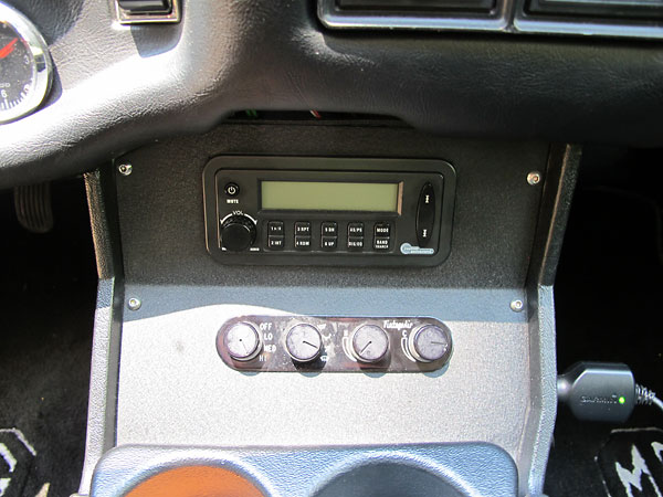 Reworked center console with Vintage Air control panel and Hidden Audio control module.