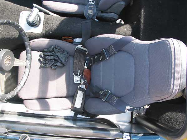 Mazda Miata seats and four point safety harnesses