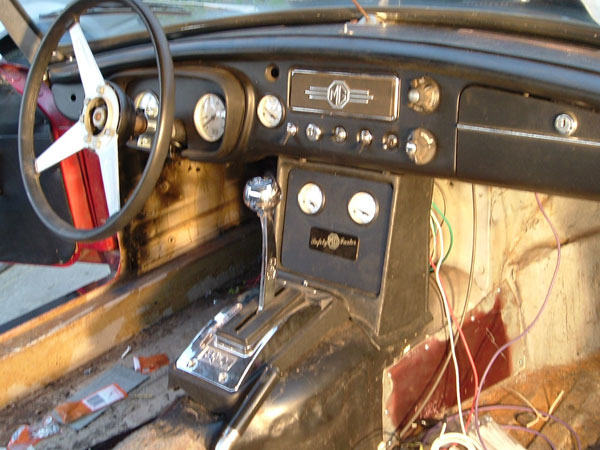 Speaker console reworked to house two gauges.