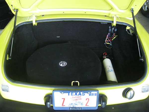 Finished trunk, with spare tire.