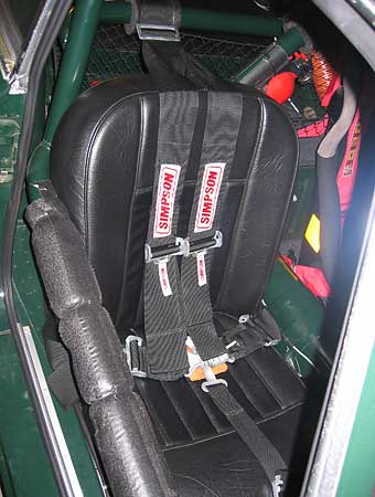 stock MGB seat with Simpson belts