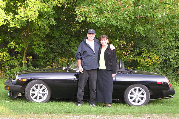 Martyn and Carol Harvey, with their 1980 MGB V8