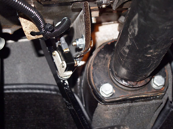 Brake light switch replaced / relocated to footbox.