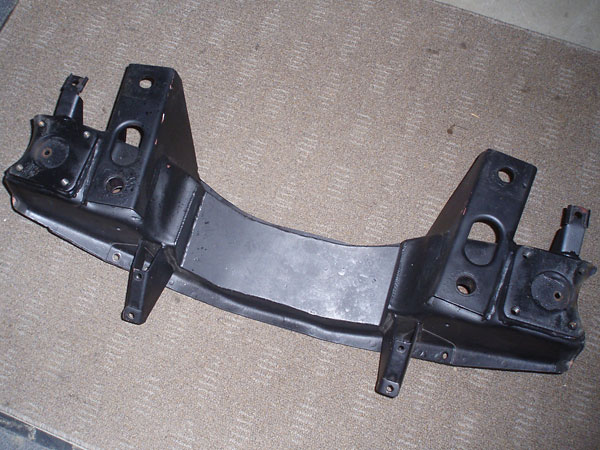 Modified front crossmember to accommodate Ford 302 engine and Hoyle coilover front suspension.
