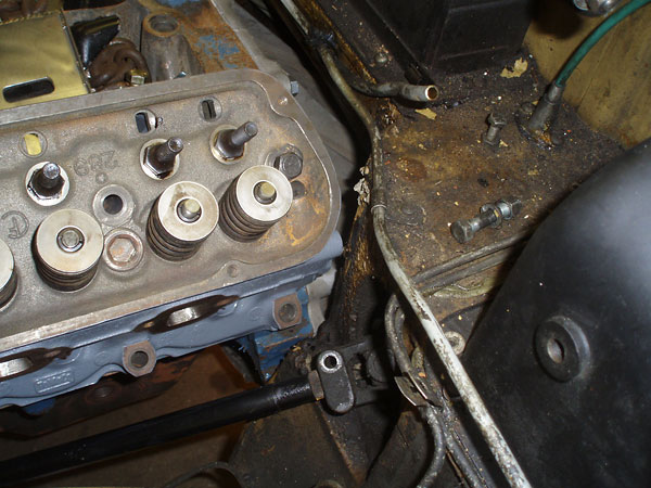 Checking cylinder head to footbox clearance.