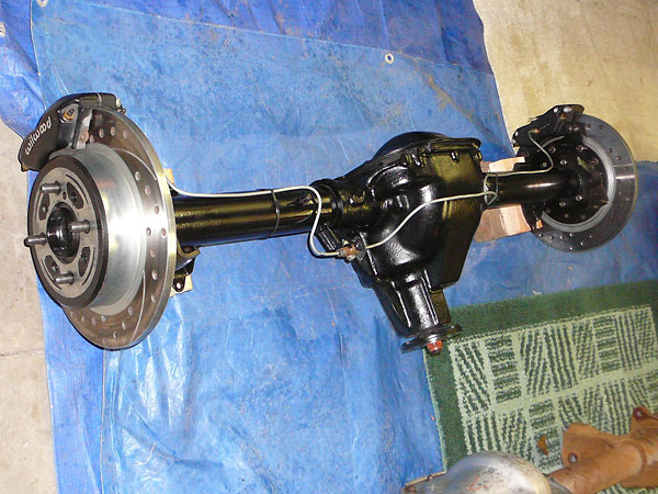 Purchased Ford 8.8 posi rear axle, narrowed to MGB width.