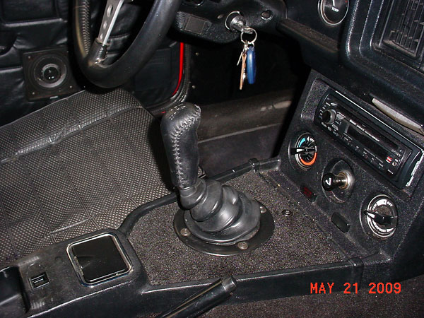 Leather covered gear shift knob.