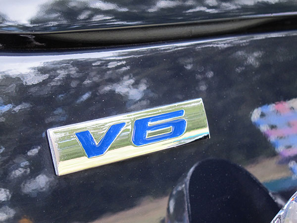 V6 badge.