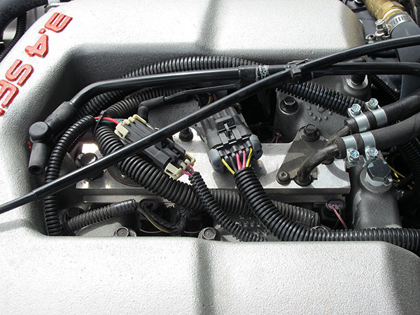 Wiring for stock sequential electronic fuel injection.