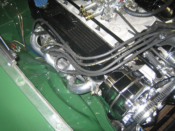 Edelbrock carburetor. Delco-Remy style alternator.