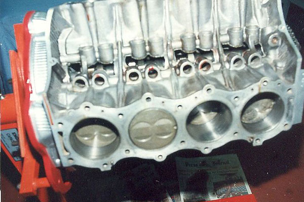 This is what Olds 215 pistons look like. Buick or Rover pistons would be dished.