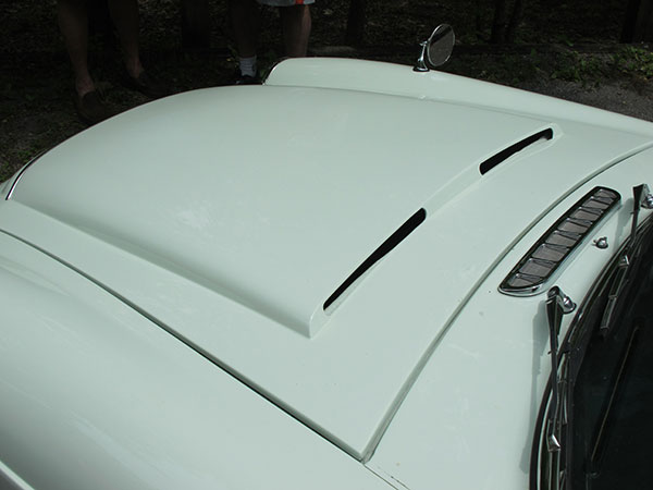 Fiberglass MGC-style bonnet, with special cowl induction vent holes.