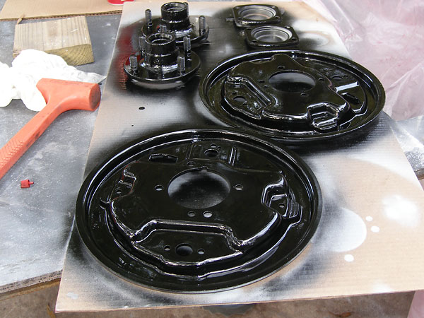 4-lug hubs and drum brake backing plates.