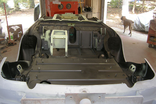 The body has been modified to suit a centered fuel tank and dual tailpipes.