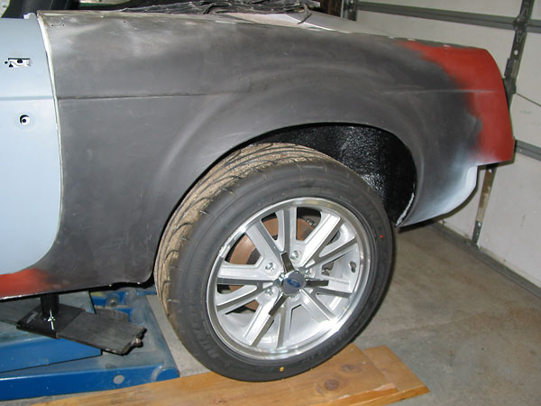 With a coat of rugged paint, the inside surfaces of the flared fenders are complete.