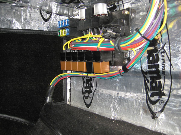 The Advance Auto-Wire wiring system features a modernized fuse and relay block.
