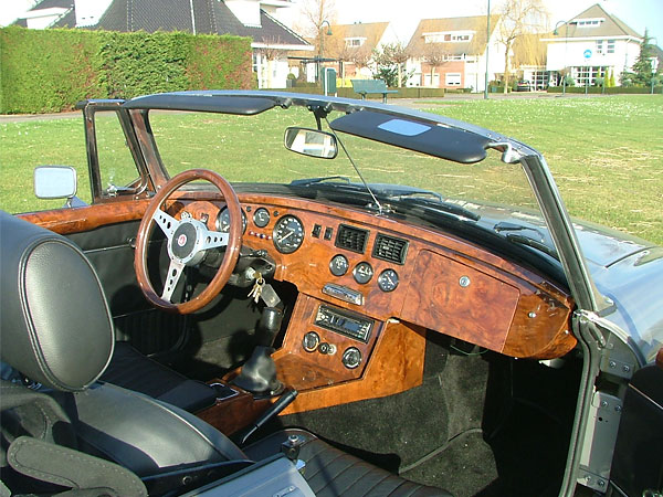 walnut dashboard, interior trim, and steering wheel