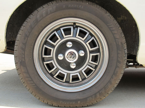 Made by Dunlop, these original MGB GT V8 wheels have cast aluminum centers riveted to steel rims.