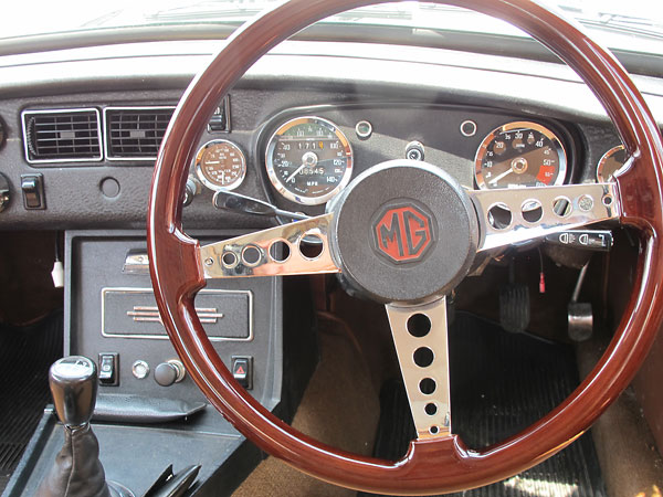 Aftermarket wooden steering wheel.