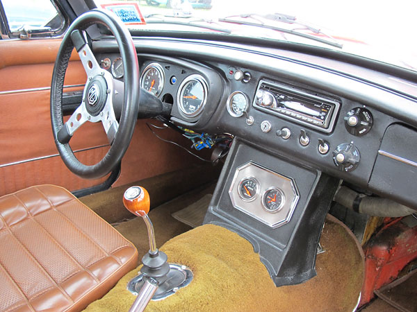 AutoMeter speedometer, tachometer, voltmeter, and clock. JVC stereo.