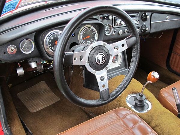 Leather wrapped aftermarket steering wheel.