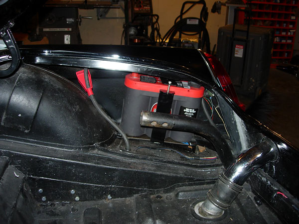 Twin Optima 6 Volt batteries mounted in series, in the trunk behind the wheel wells.