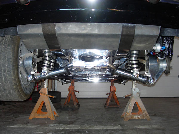 Jaguar independent rear suspension. Aldan coilover shock absorbers.