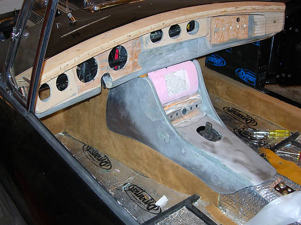 A contoured aluminum switch panel has been added, and a GPS installation is prototyped in pink styrofoam.
