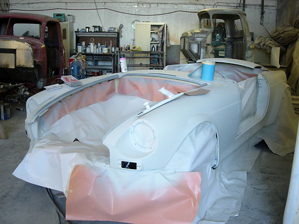 Murray Ballance of Bassanno Auto Body created flared rocker panels for Roger's MGB.
