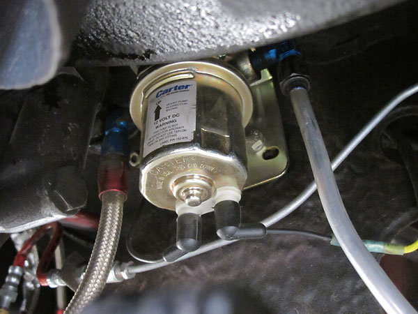 Carter fuel pump needs to be mounted upright, so that the motor is bathed in fuel during operation.