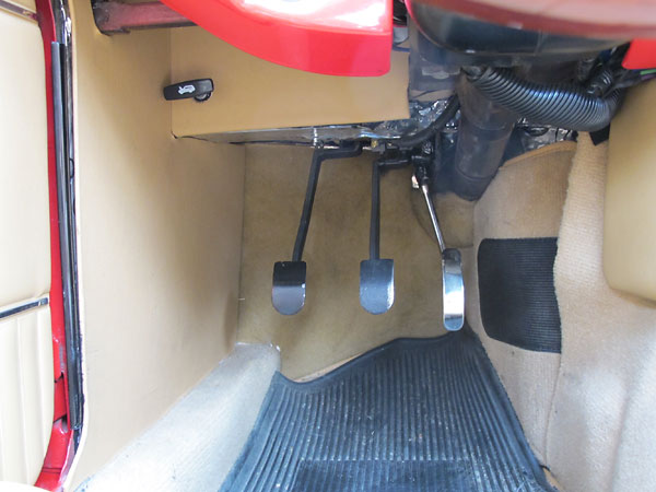 Clutch and brake pedals have been cut-and-rewelded to shift them to the left.