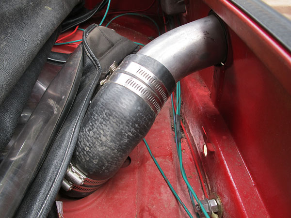 Scott centered his fuel tank to facilitate symmetrical dual exhaust.