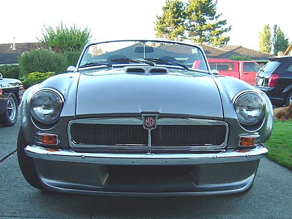 Original MGB grille-surround (re-chromed), owner-installed mesh insert