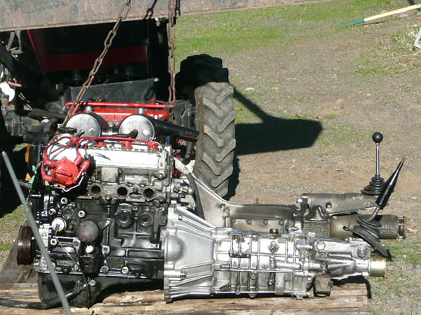 The Toyota engine is tall in front, partly due to a front-sump oil pan.