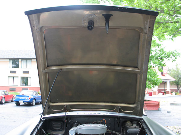 Steve removed the paint on the underside of the hood, using paint stripper and paint brushes/soft clothes.