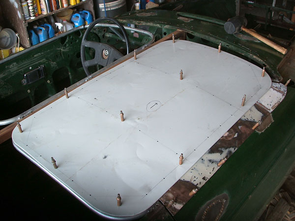 Removable passenger-side aluminum tonneau cover.