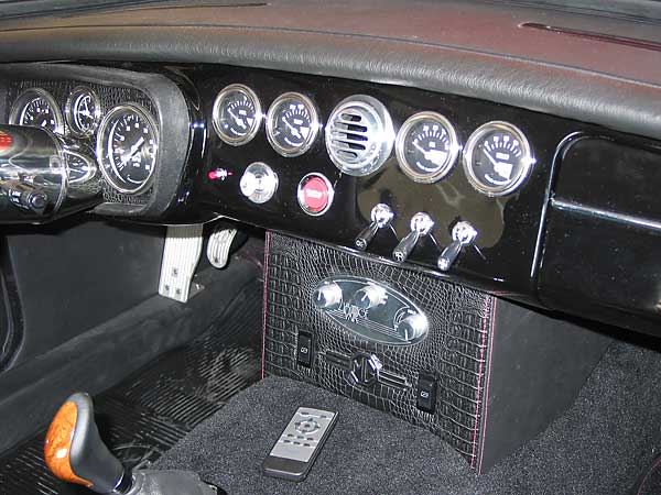 those toggle switches are from a Maserati... and that's the remote for the stereo
