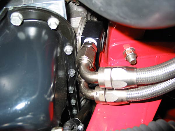 Plumbing for the Ford engine's remote oil filter.