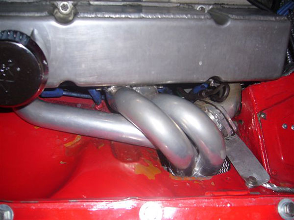 custom through-the-fender headers