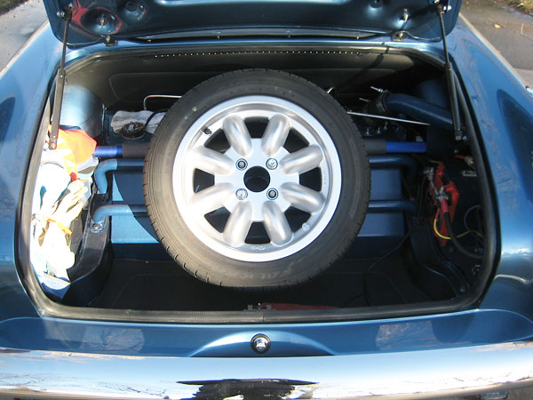 Mounting provision for full size spare tire.