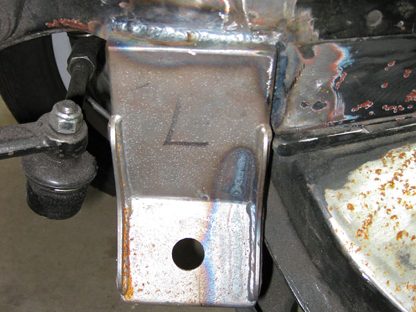 Fabricated steel motor mount brackets.