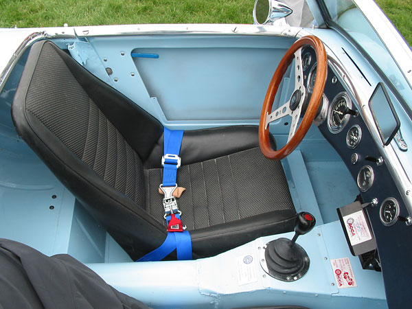 note the convenient, removable shifter access cover