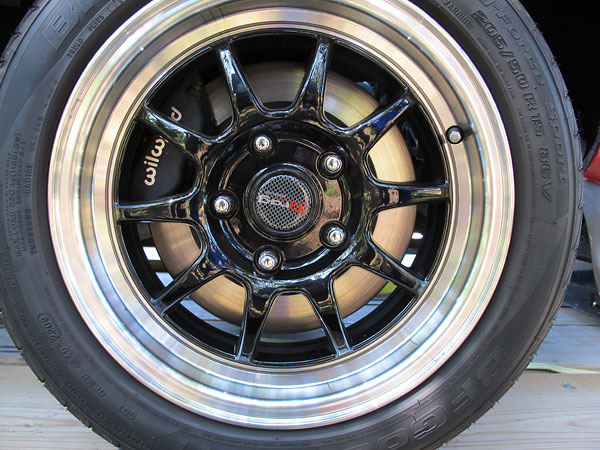Drag Extreme Alloys 10-spoke aluminum wheels. BF Goodrich g-Force Sport 205/50R15 tires.