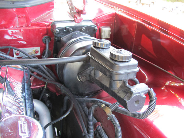 Dodge truck master cylinder, with original Jensen Healey power brake booster.